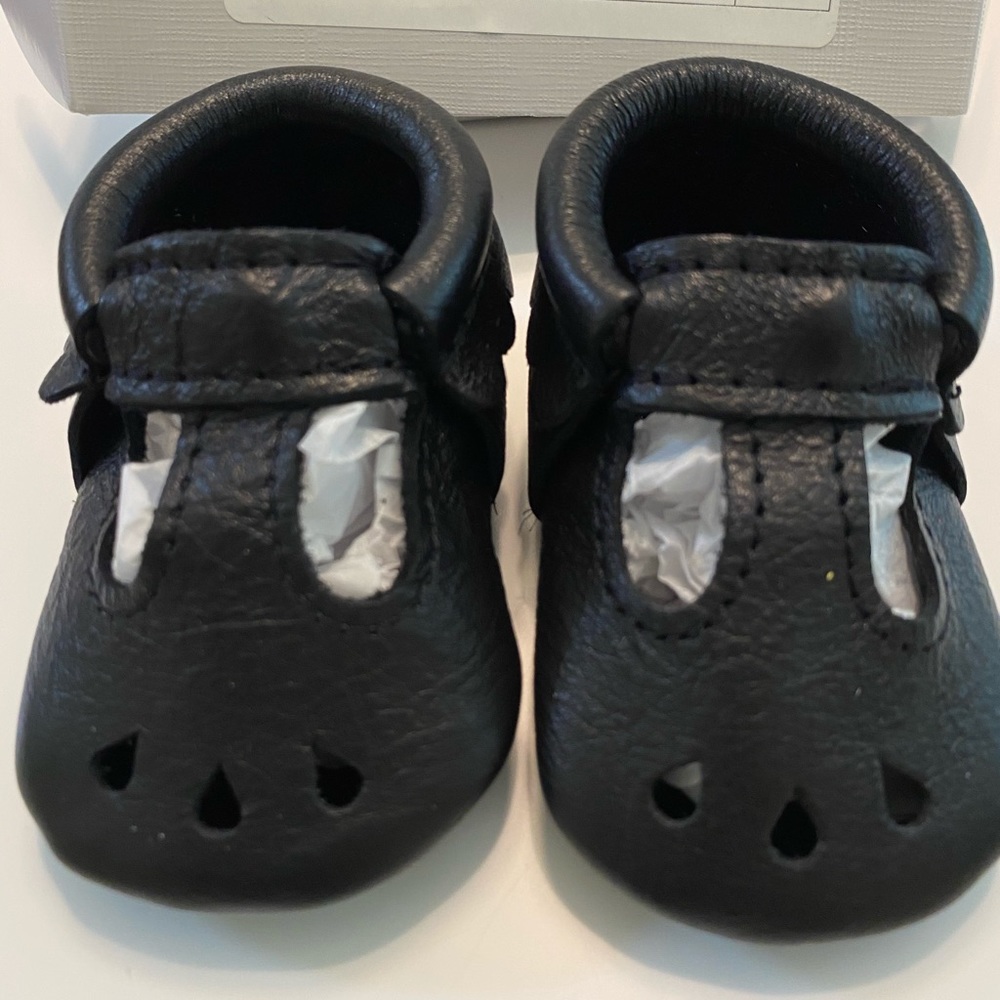 Freshly picked black Mary Jane moccasins